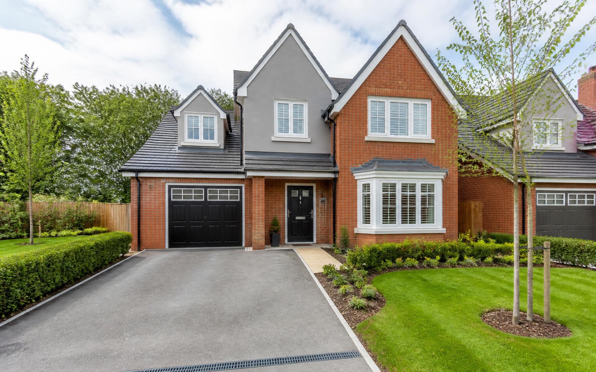 New-build detached family home with driveway in a Surrey development